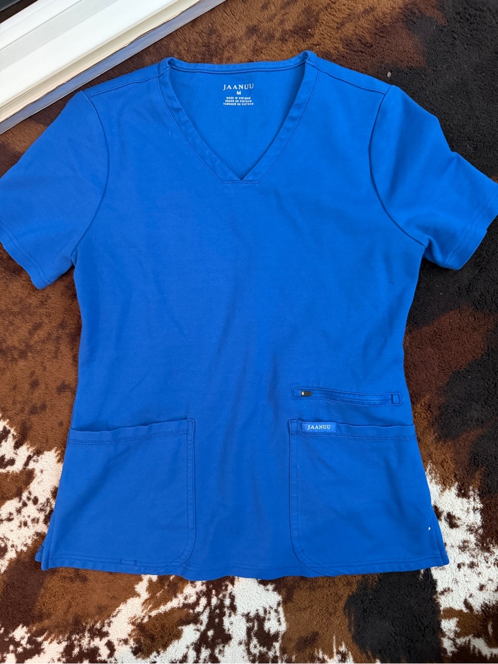 Jaanuu Women's V-Neck Scrub Top in Royal Blue Medium. Stretchy